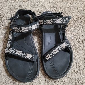 Teva womens black and floral sandals. 8. EUC